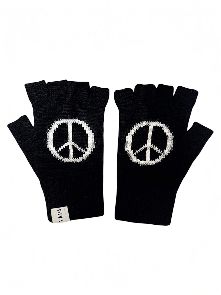 black alpaca fingerless gloves with a white peace sign design in each hand