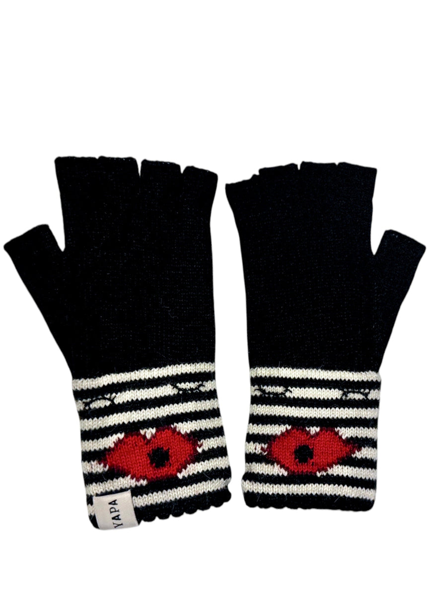 A pair of black fingerless gloves with white stripes and a red heart pattern on the wrist area. The gloves are made of baby alpaca wool and have a ribbed cuff.