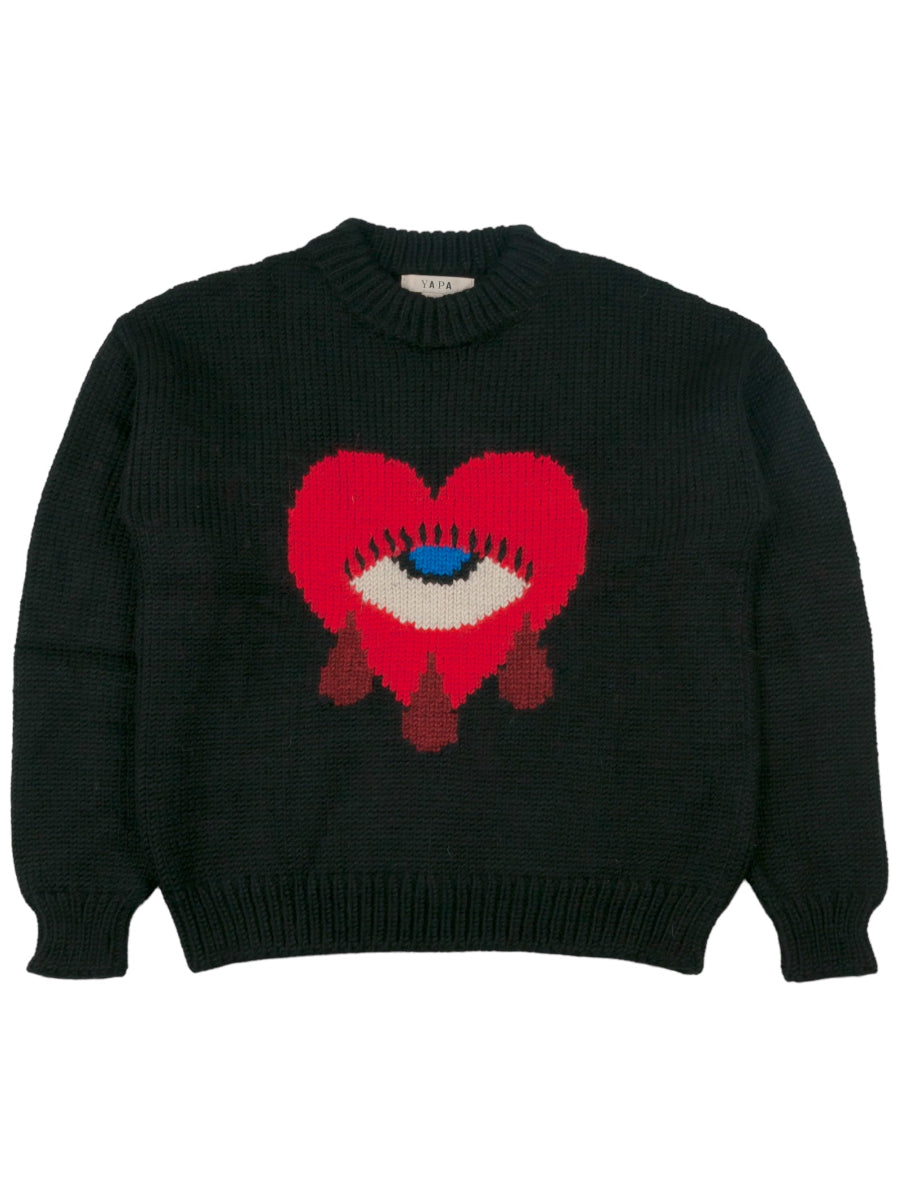 blackalpaca sweater featuring a bold red heart motif with a blue eye and tear details on the front