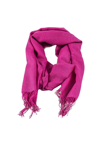 hot pink alpaca scarf featuring a soft woven texture and fringed edges, shown against a plain background.