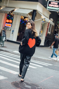 cute girl in New York with  alpaca cardigan black with heart  