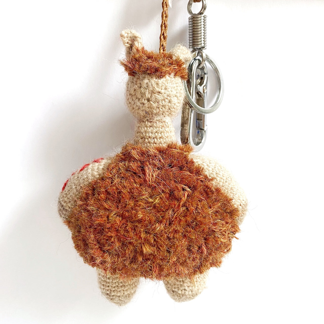 alpaca bag charm and keychain hand knitted in crochet brown