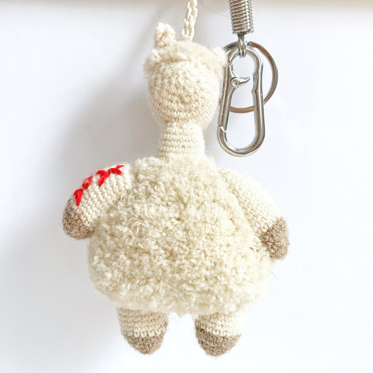 alpaca wool white keychain hand knitted in crochet