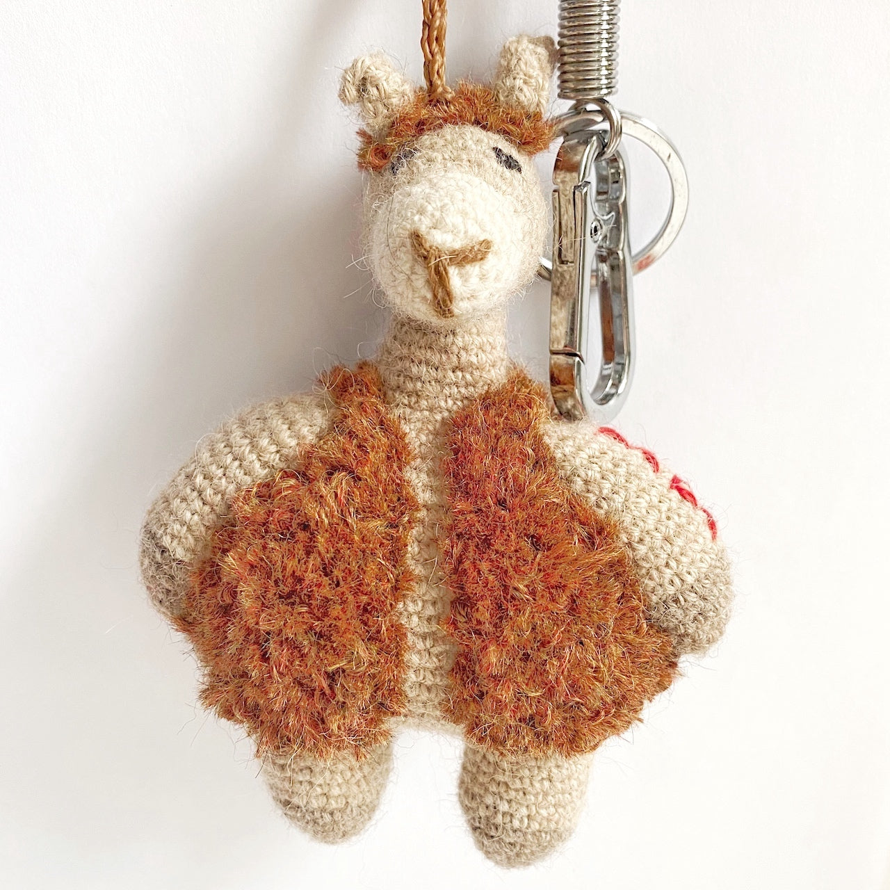 hand knitted alpaca keychain and bag charm brown