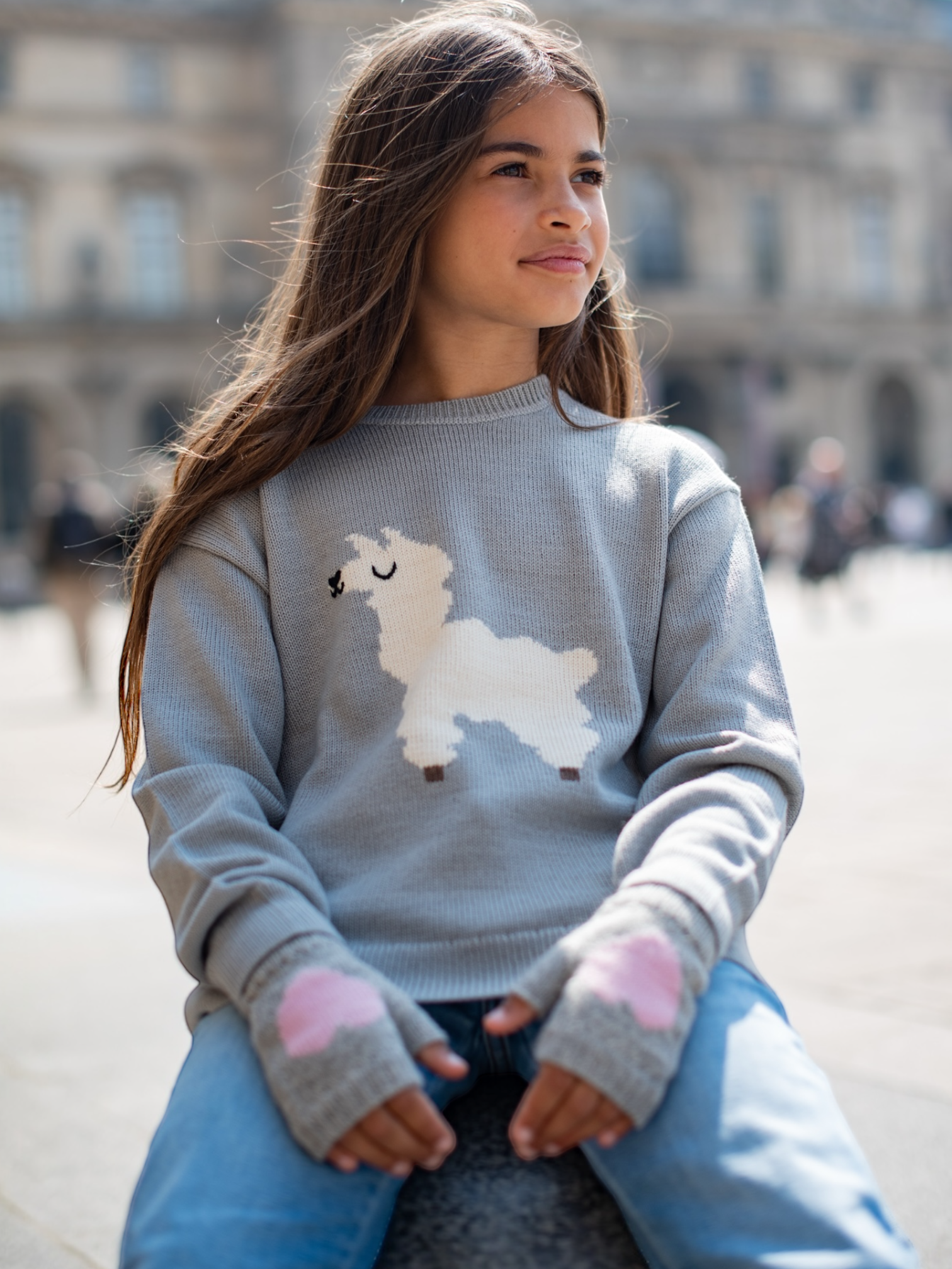 girl wearing alpaca design girls sweater and heart mittens yapa