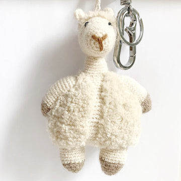 crochet knitted alpaca bag charm with white background
