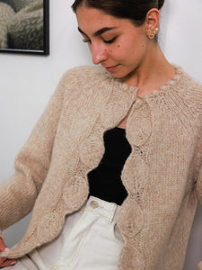 Suéter acogedor con trenzas