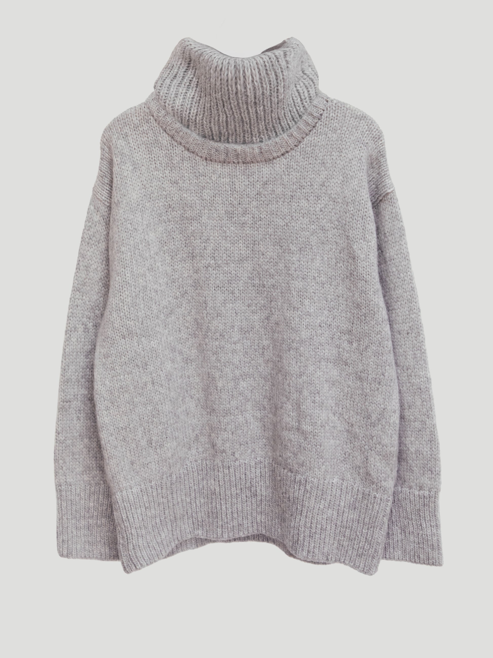 Gray turtleneck sweater on a light gray background