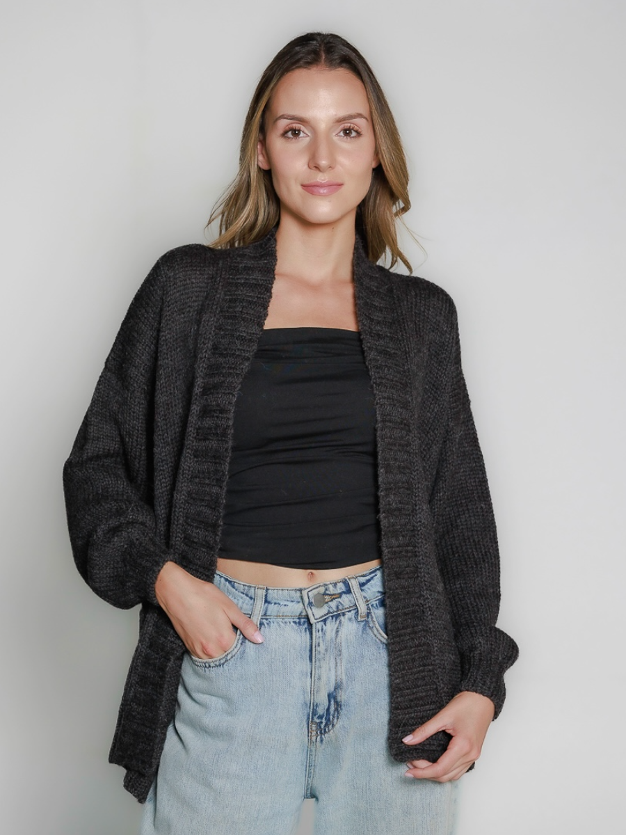 Dark grey alpaca sweater featuring an oversized burgundy heart motif on the back, worn by a model in a white background