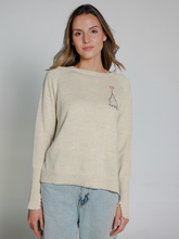 Load image into Gallery viewer, Woman wearing a white alpaca sweater with embroidered design of the Empire State Building and &#39;NYC&#39; on a white background
