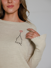 Load image into Gallery viewer, Off white sweater with embroidered design of the Empire State Building and &#39;NYC&#39; on a white background
