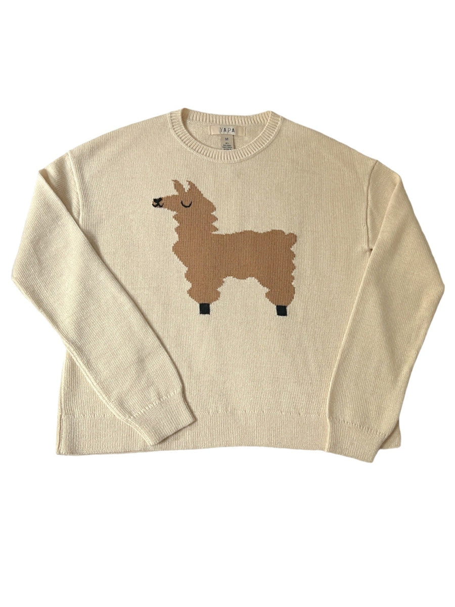 beige alpaca sweater with a brown llama motif