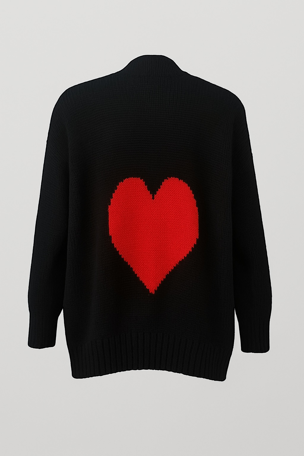 Black sweater with a red heart on the back against a light gray background
