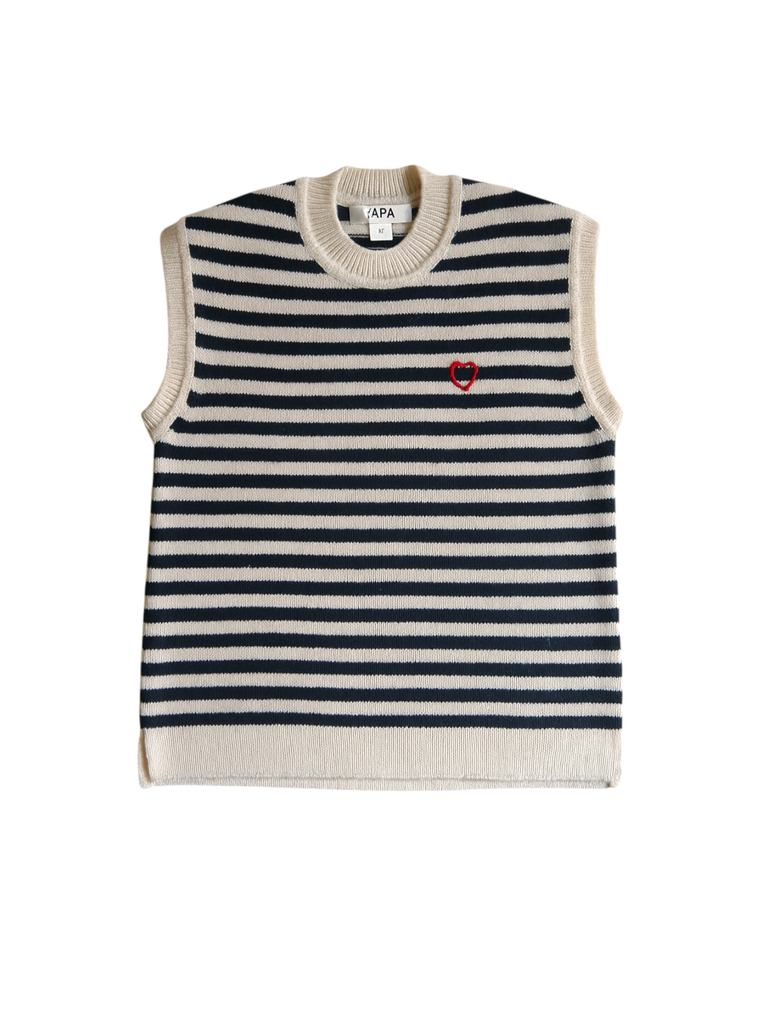 A woman modeling a sleeveless knit sweater vest with horizontal black and cream stripes, featuring a small red embroidered logo on the left chest, paired with light-wash blue jeans against a plain light gray background.