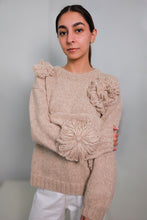 Load image into Gallery viewer, Woman wearing a beige knitted sweater with floral design. how to style a sweater.
