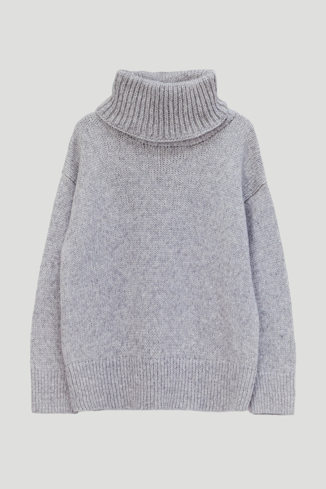A light gray knit turtleneck sweater with a ribbed collar, cuffs, and hem, displayed on a neutral light gray background.