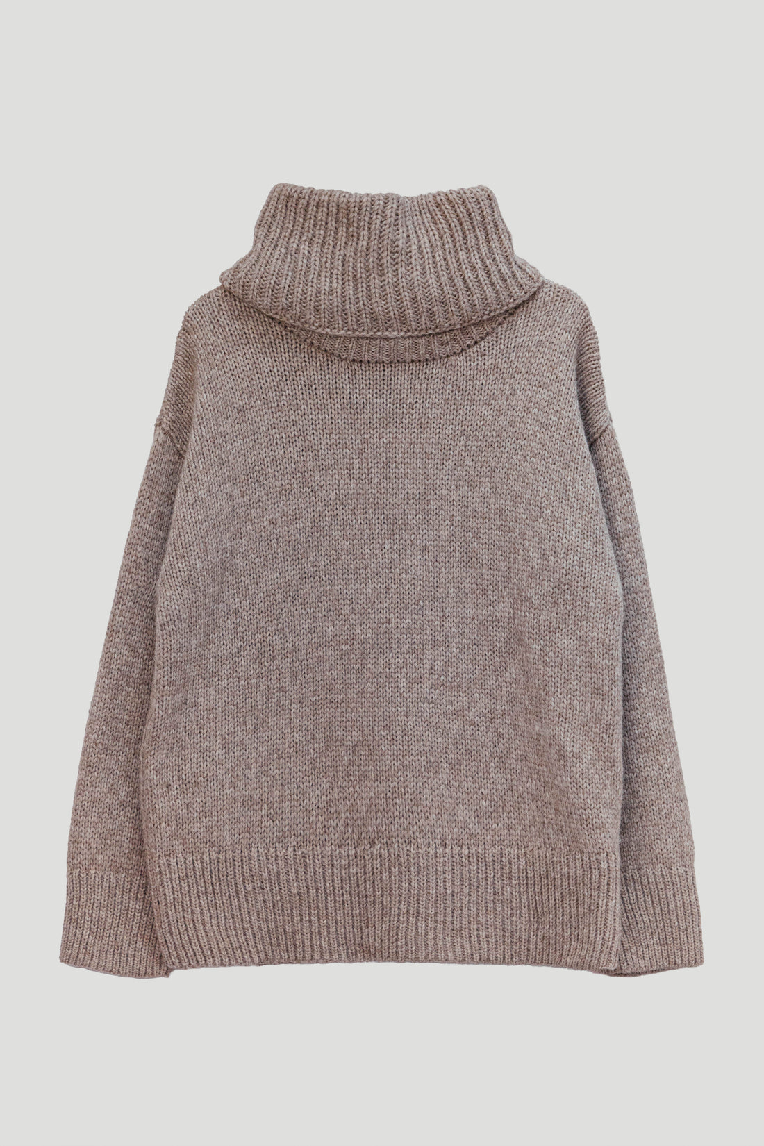 A chunky knit turtleneck sweater in a heathered taupe-brown color, shown against a solid light gray background.