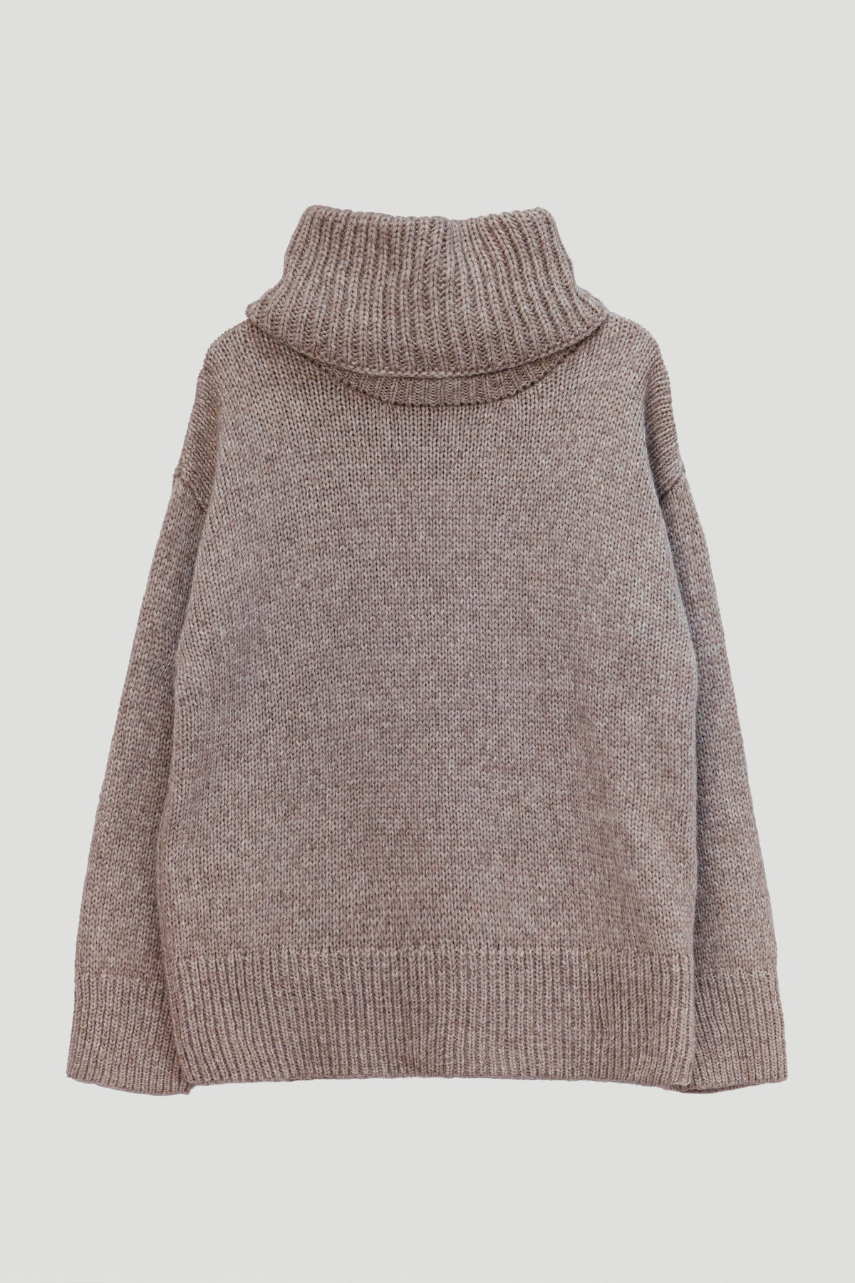 A chunky knit turtleneck sweater in a heathered taupe-brown color, shown against a solid light gray background.