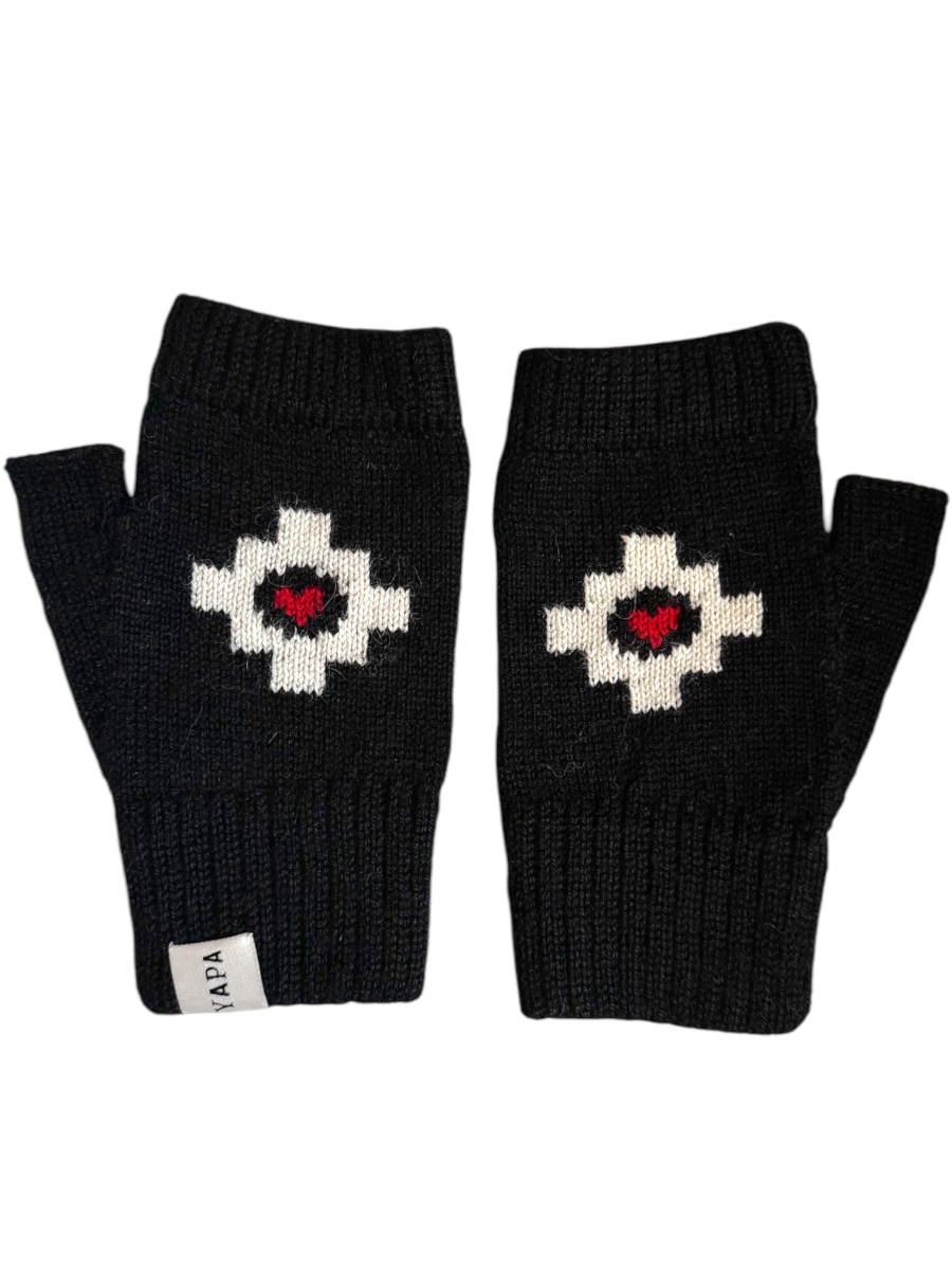 A pair of black baby alpaca mittens with a white cross pattern on a white background.