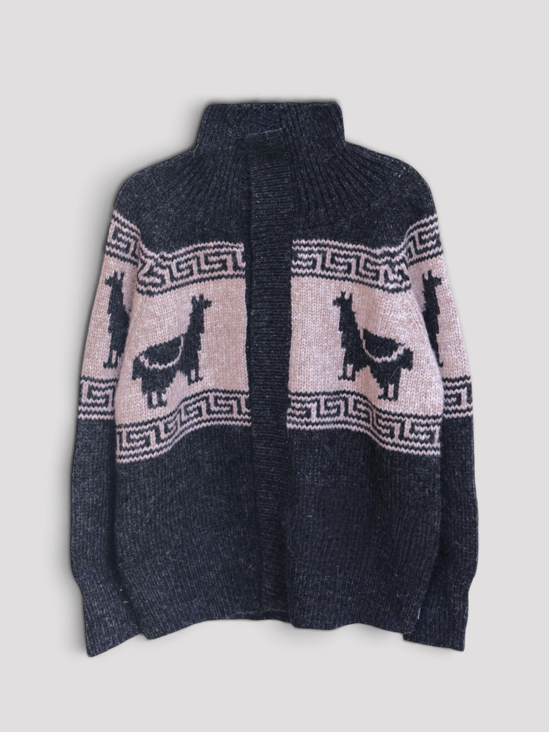 A dark grey knit button up sweater featuring light beige panels with black alpaca silhouettes, shown against a neutral light gray background.