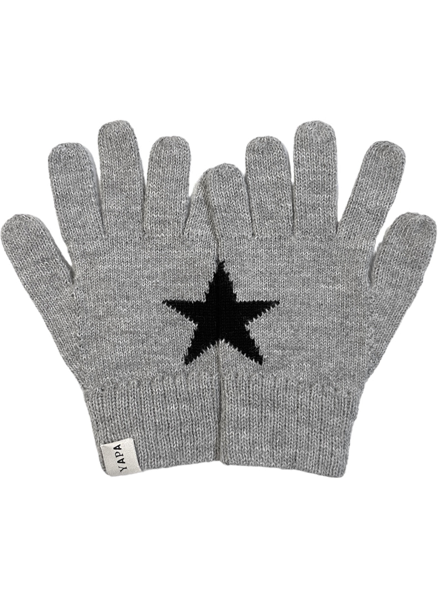 grey alpaca knitted gloves with a black star design that forms when the hands come together