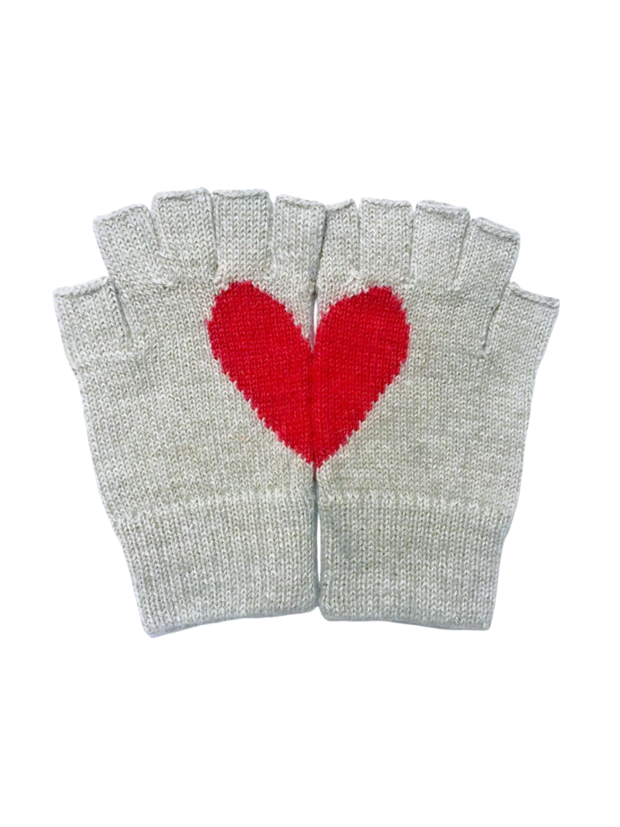 light grey alpaca knitted fingerless gloves with a red heart design that is formed when the hands are put together
