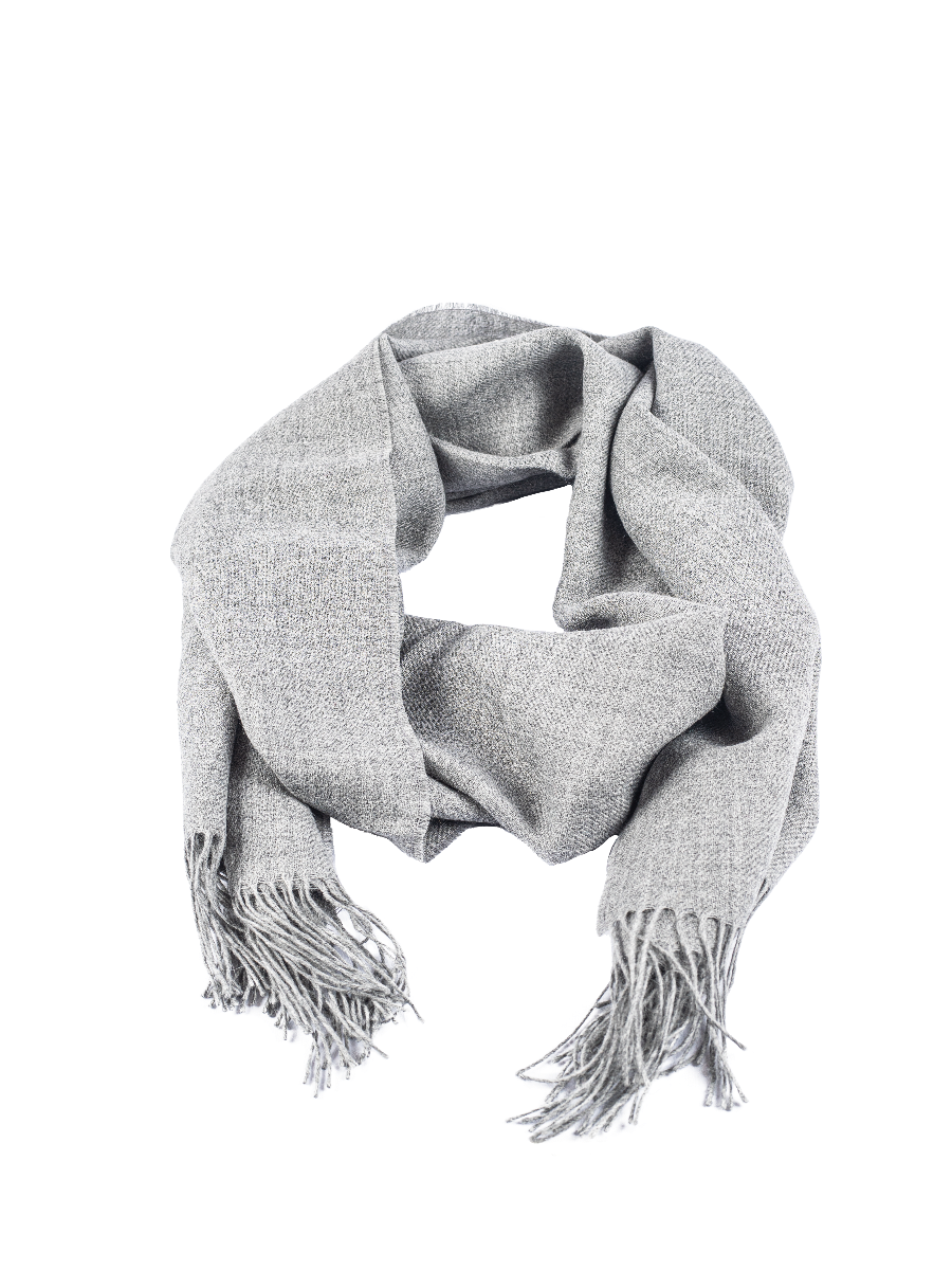light grey alpaca scarf featuring a soft woven texture and fringed edges, shown against a plain background.