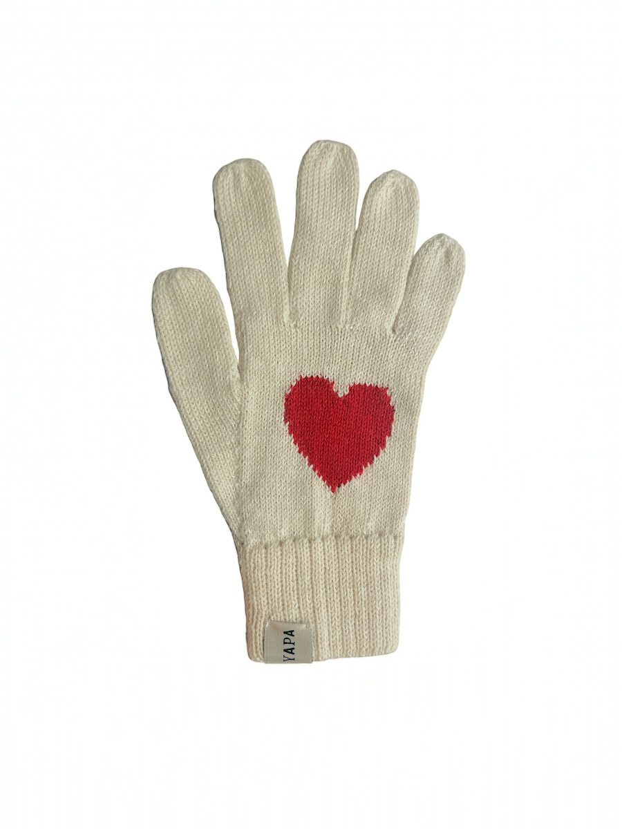 white alpaca knitted gloves with a red heart design in each hand