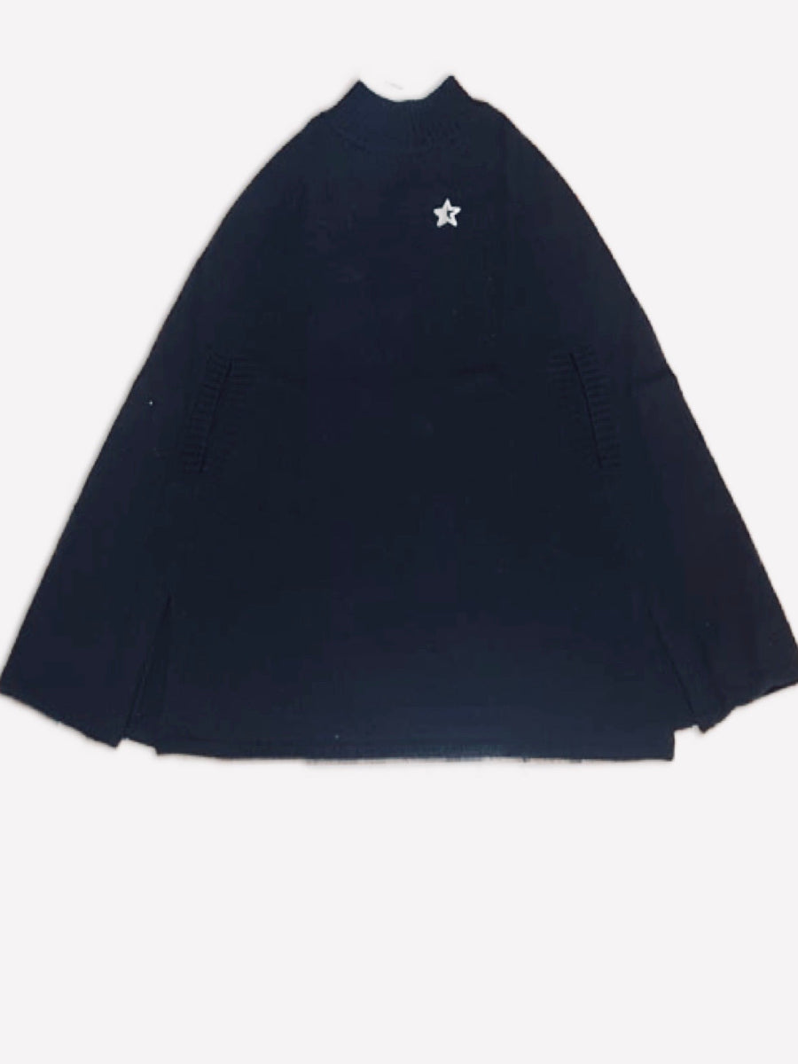 black baby alpaca knitted poncho with a white star detail