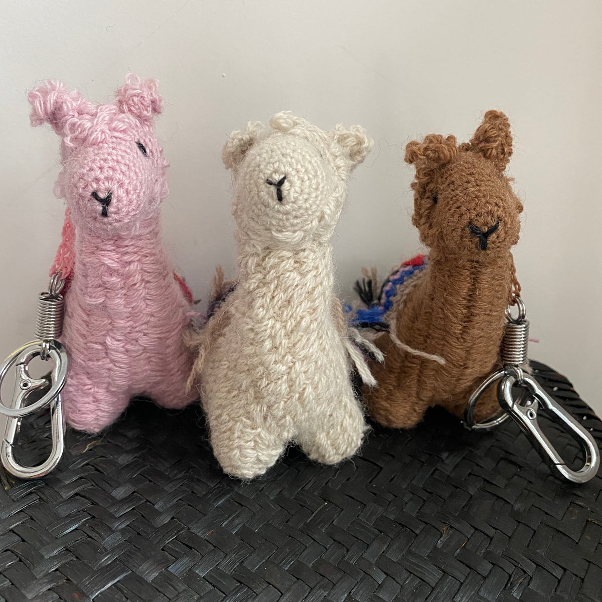 handmade alpaca keychain and bag accessories sustainably made in Bolivia  by artisans in pure baby alpaca wool 